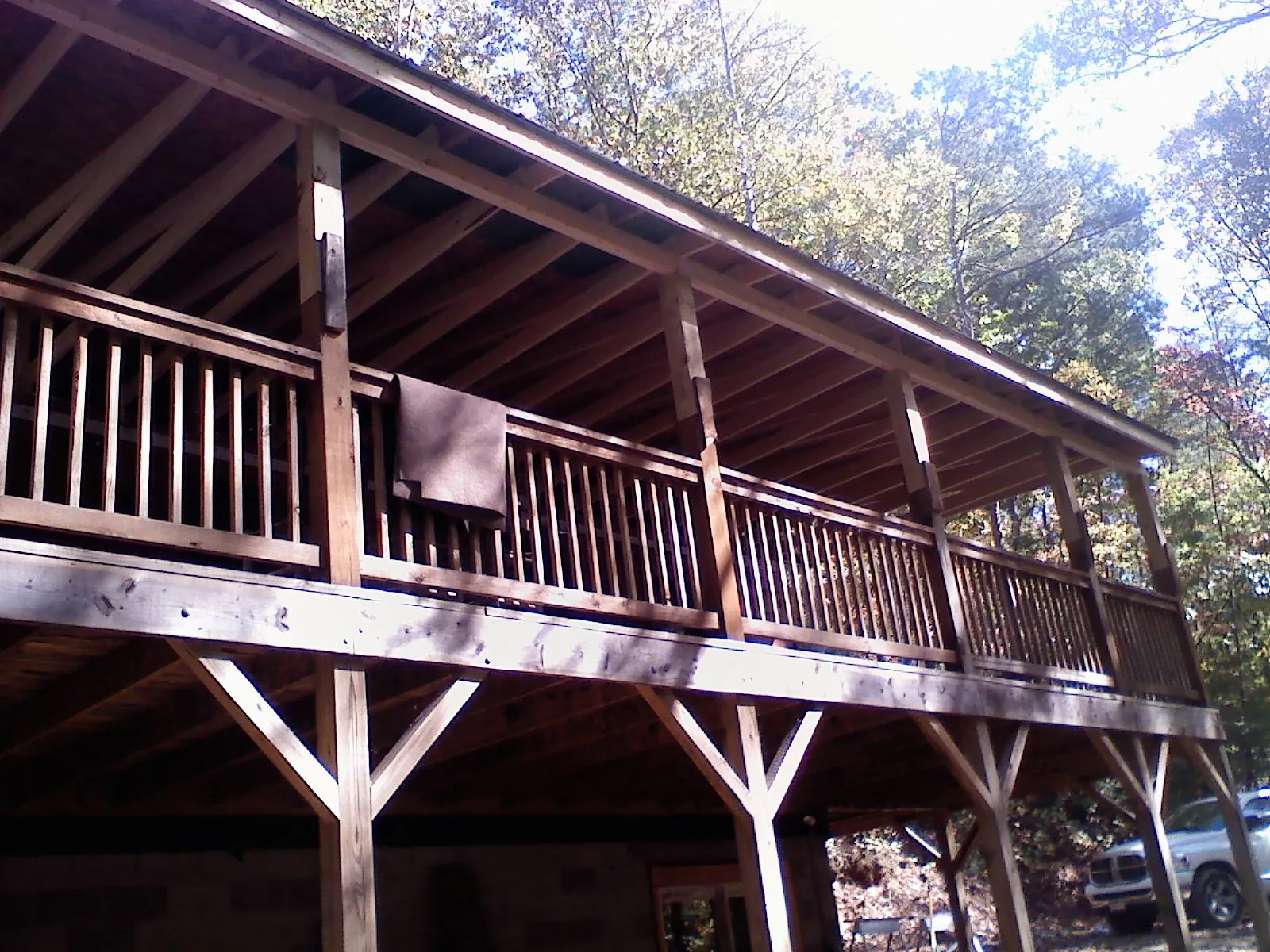 Timber framing under a new elevated porch and deck — Roof Leak Repair in Winslow by Roofing Brothers